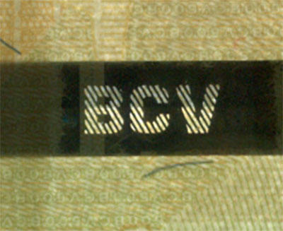 Piece bbcv500bss-aa02-e8 (Obverse, partial, in front of light)